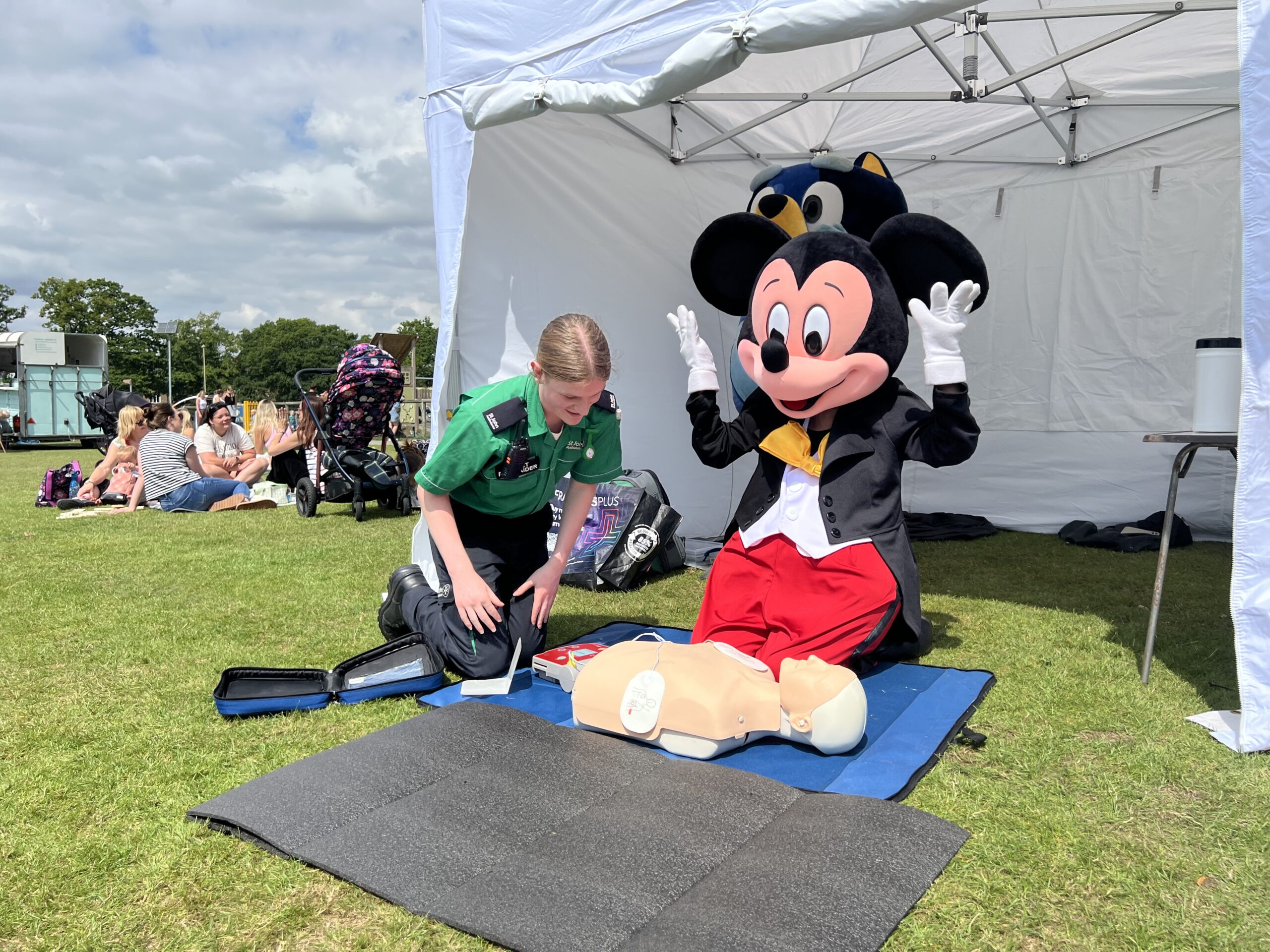 Picnic in Park Mickey doing CPR
